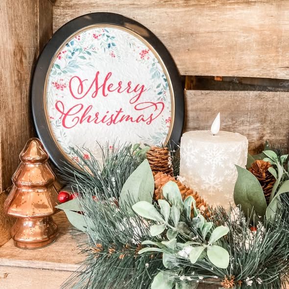 Merry Christmas sign with a candle and copper tree