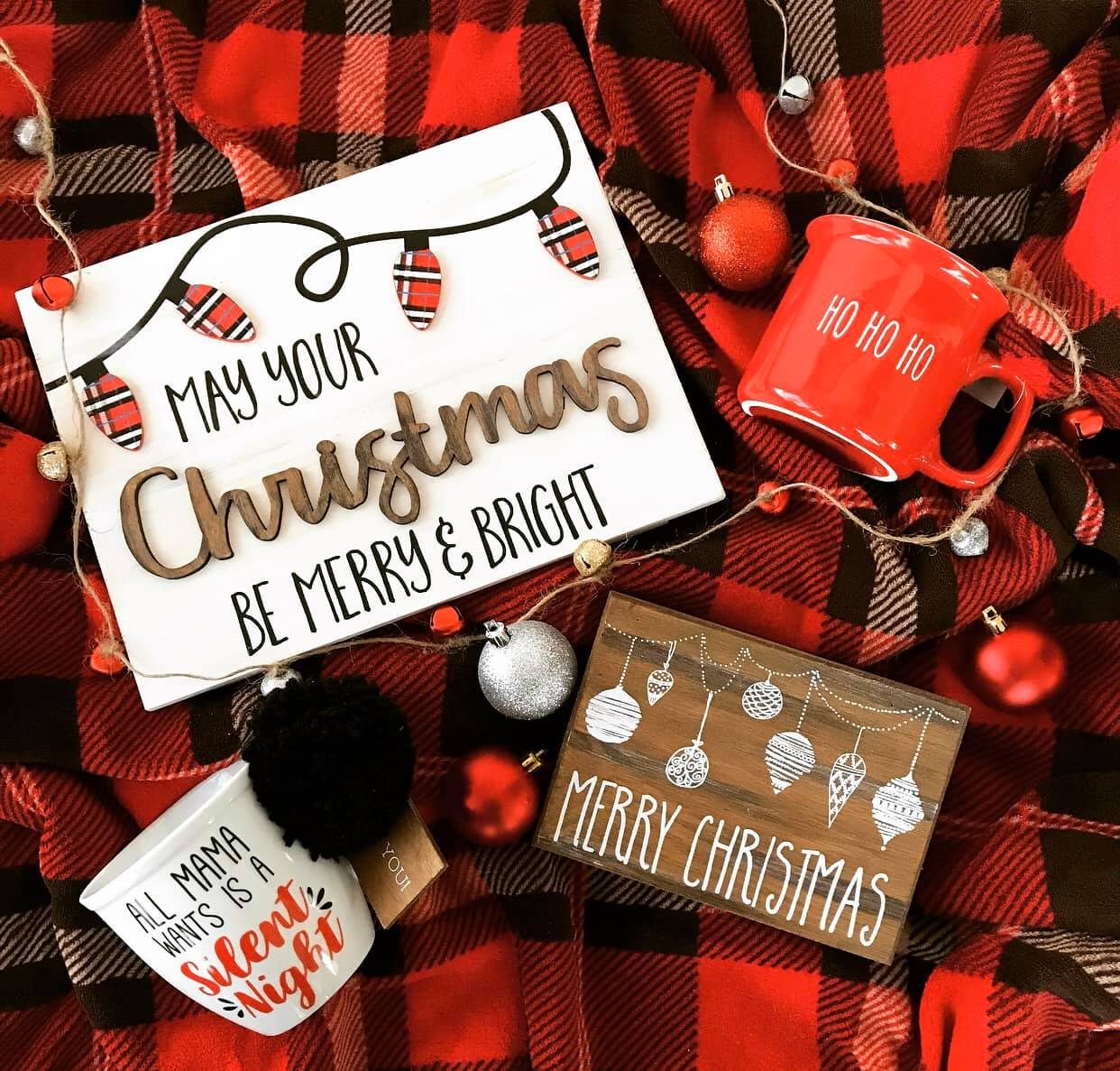 Buffalo plaid flat lay with Merry Christmas signs and mugs